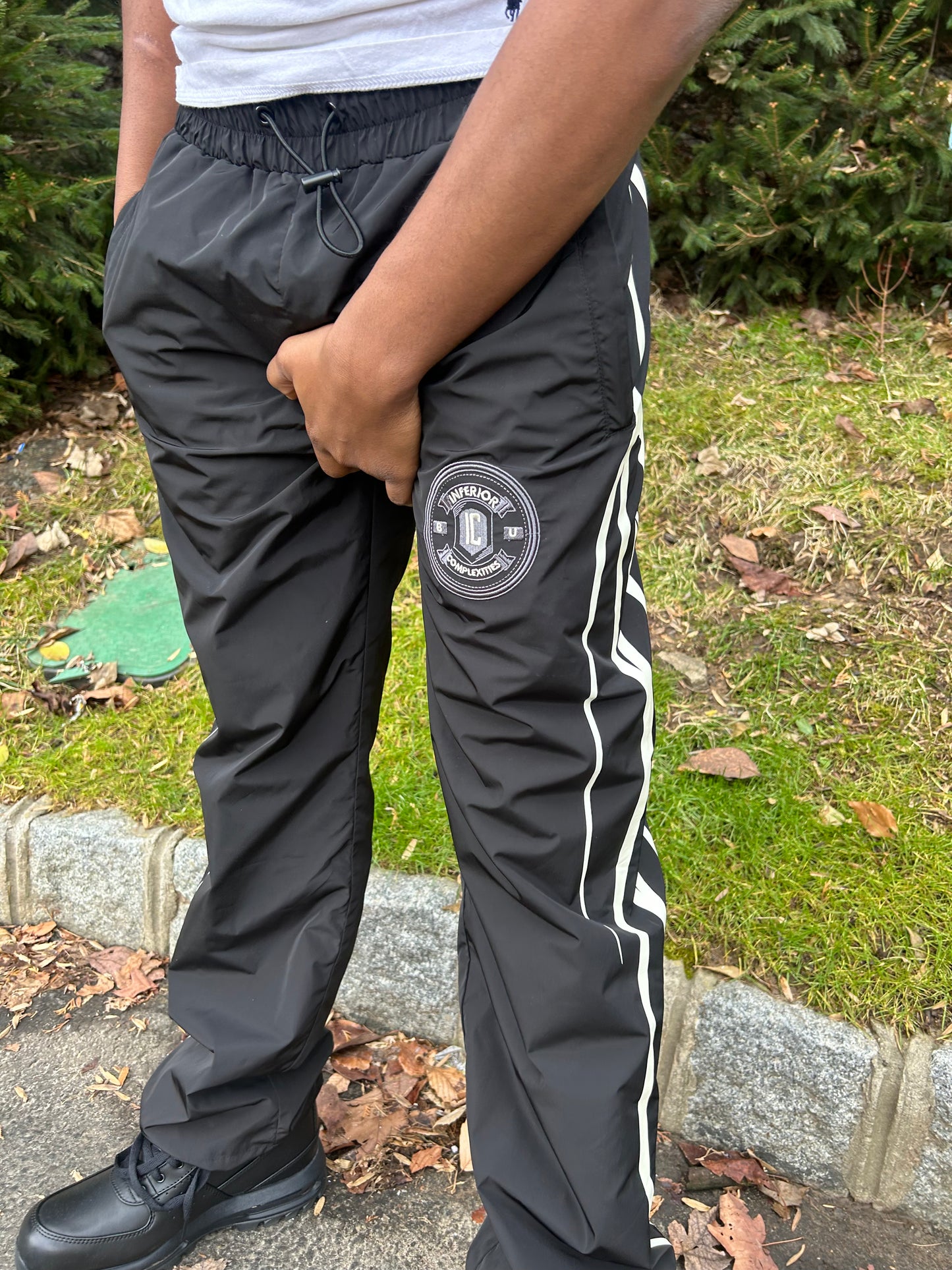 WATERPROOF TRACK PANTS