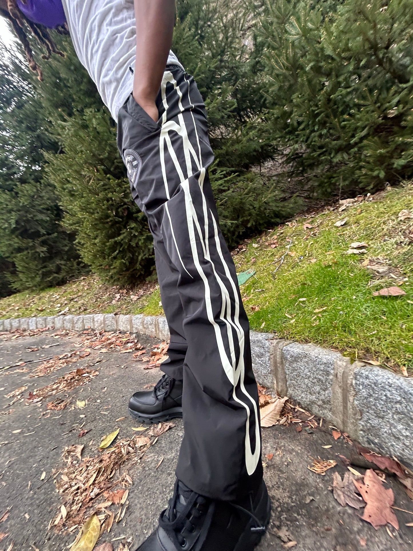 WATERPROOF TRACK PANTS