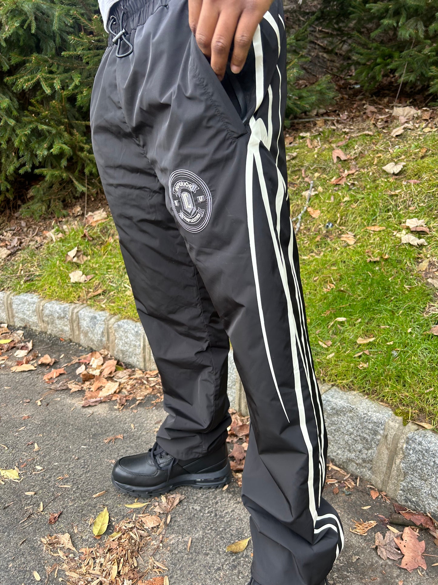 WATERPROOF TRACK PANTS