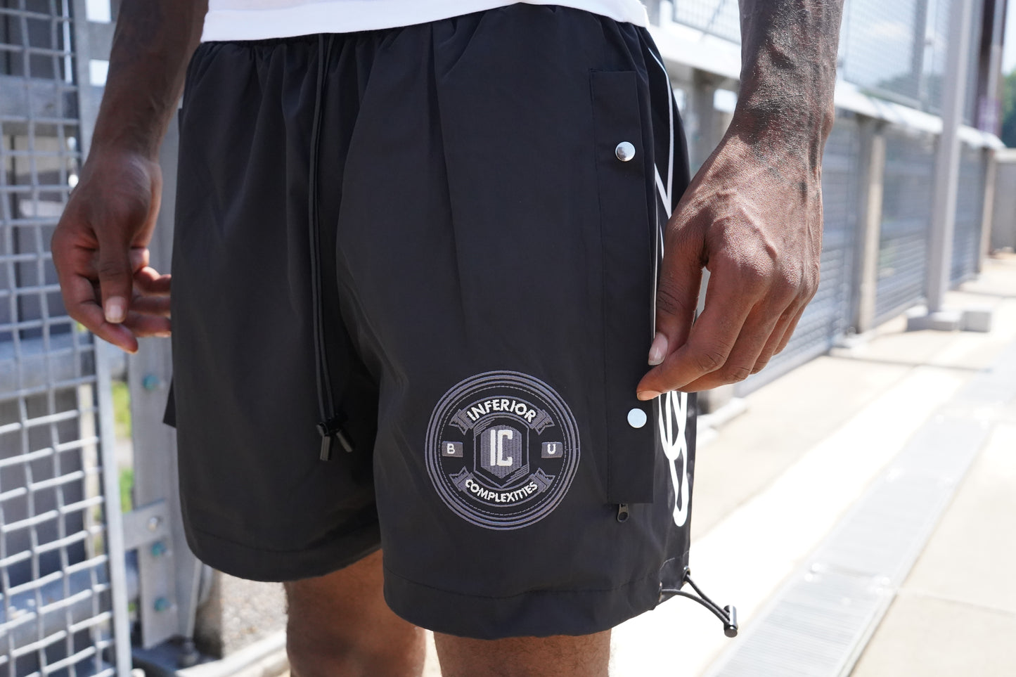 WATERPROOF TRACK SHORTS